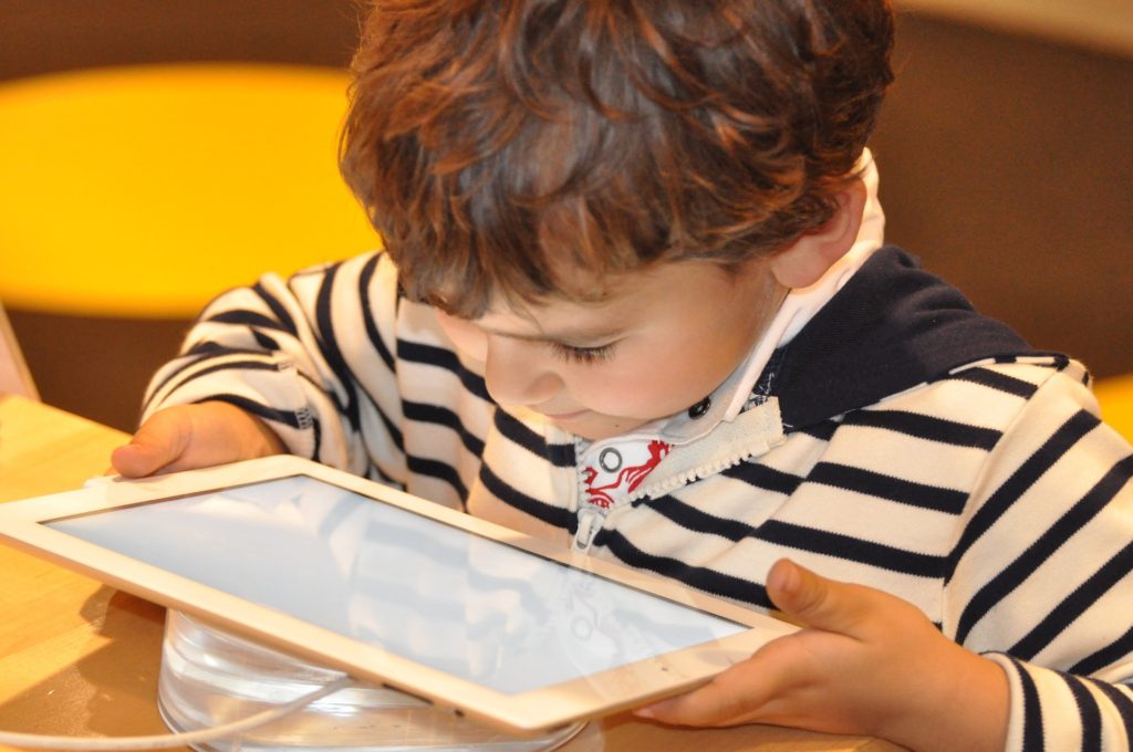 Playground equipment can help children develop with communication and social skills